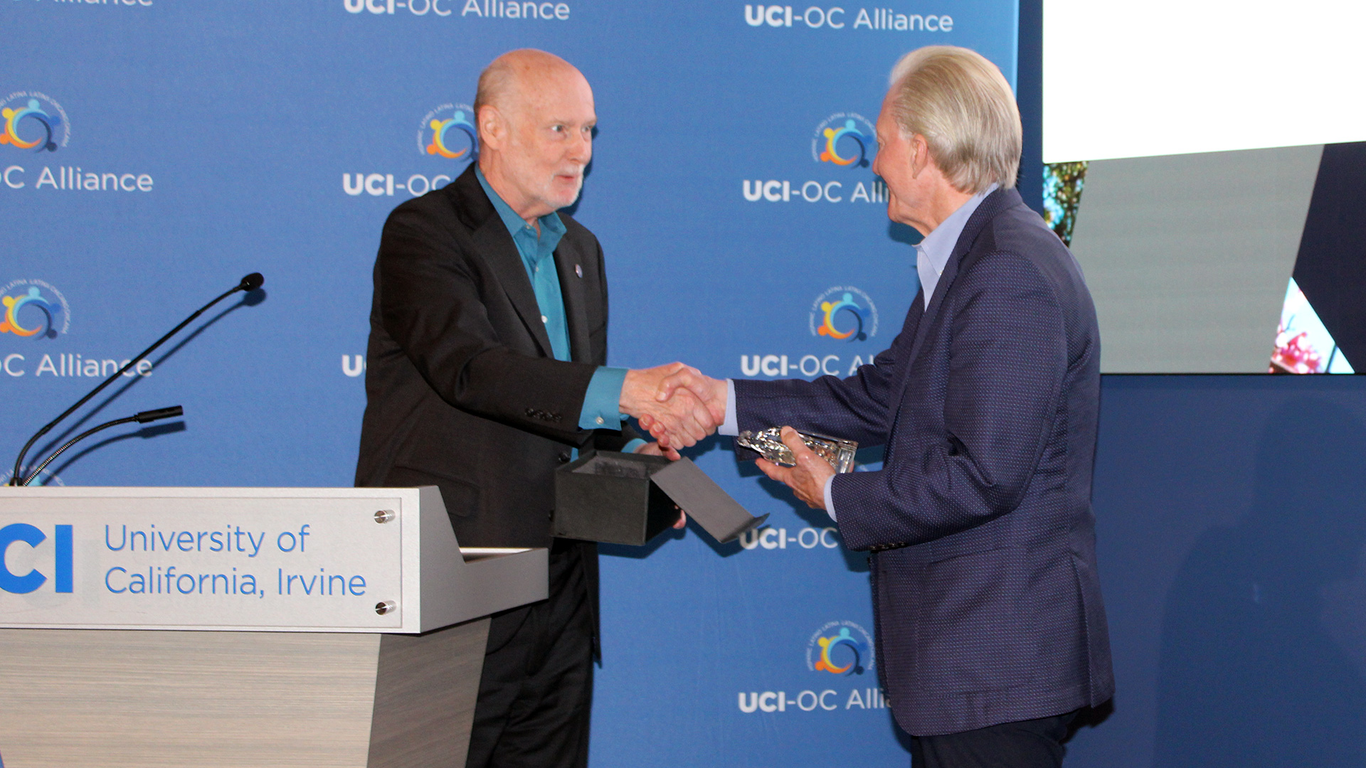 Chancellor Gilman with Dean A. Yoost at the UCI-OC Alliance Spring Meeting
